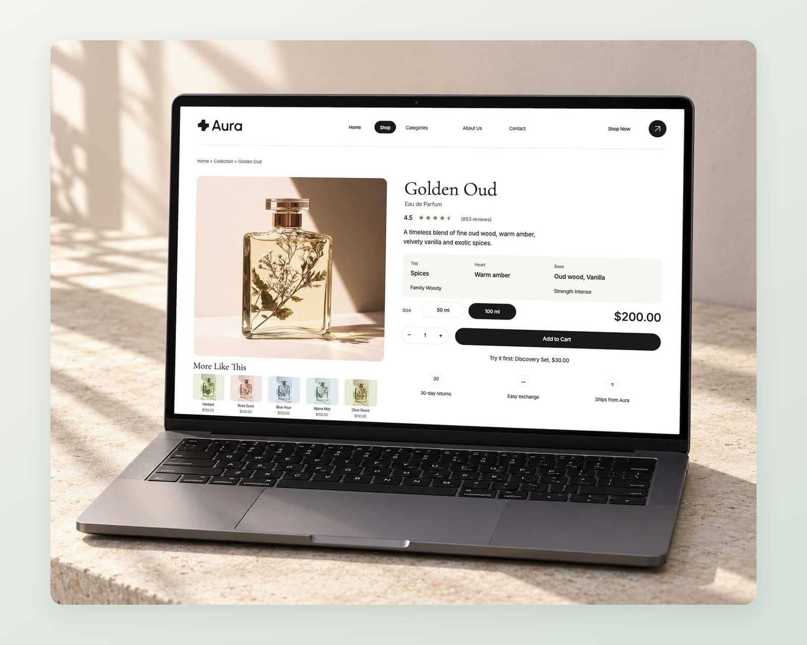 Aura’s Golden Oud eau de parfum page with the bottle photograph, 4.5 rating from 853 reviews, spice, amber, oud and vanilla notes, 50 ml and 100 ml sizes, $200.00 and a black Add to Cart button