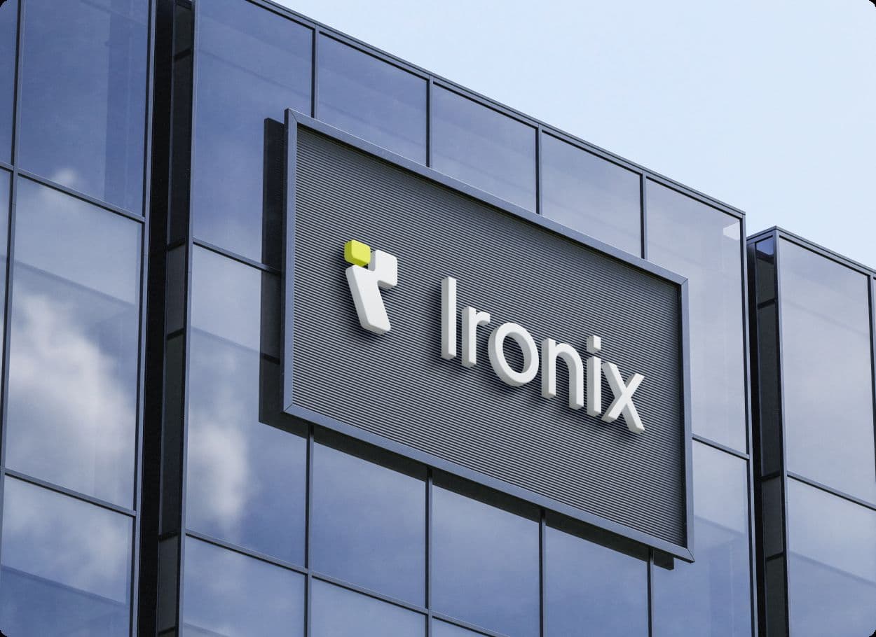 The Ironix name and mark on a sign fixed to a glass building