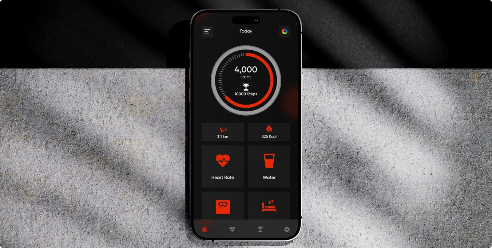 The step counter app’s home screen on a phone, showing 4,000 steps inside a red ring