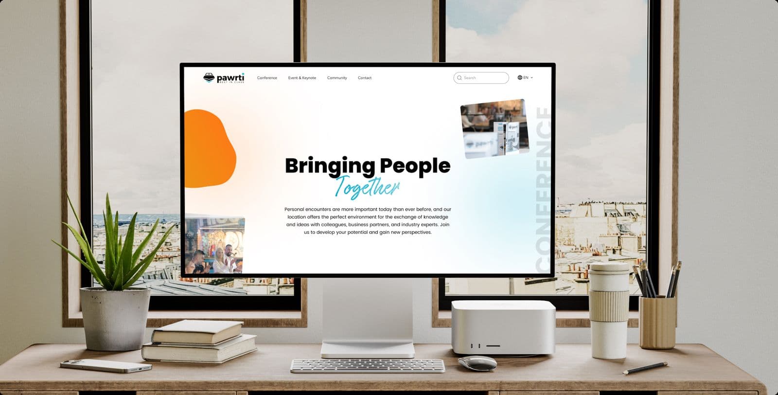 The Pawrti website on a desktop monitor, with the headline Bringing People Together
