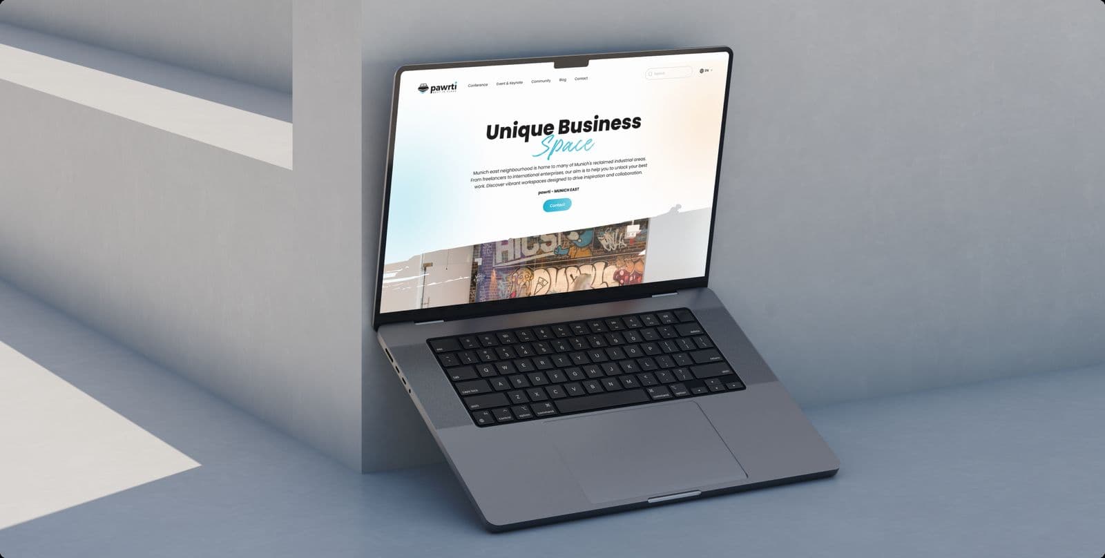 The Pawrti homepage on a laptop, with the headline Unique Business Space