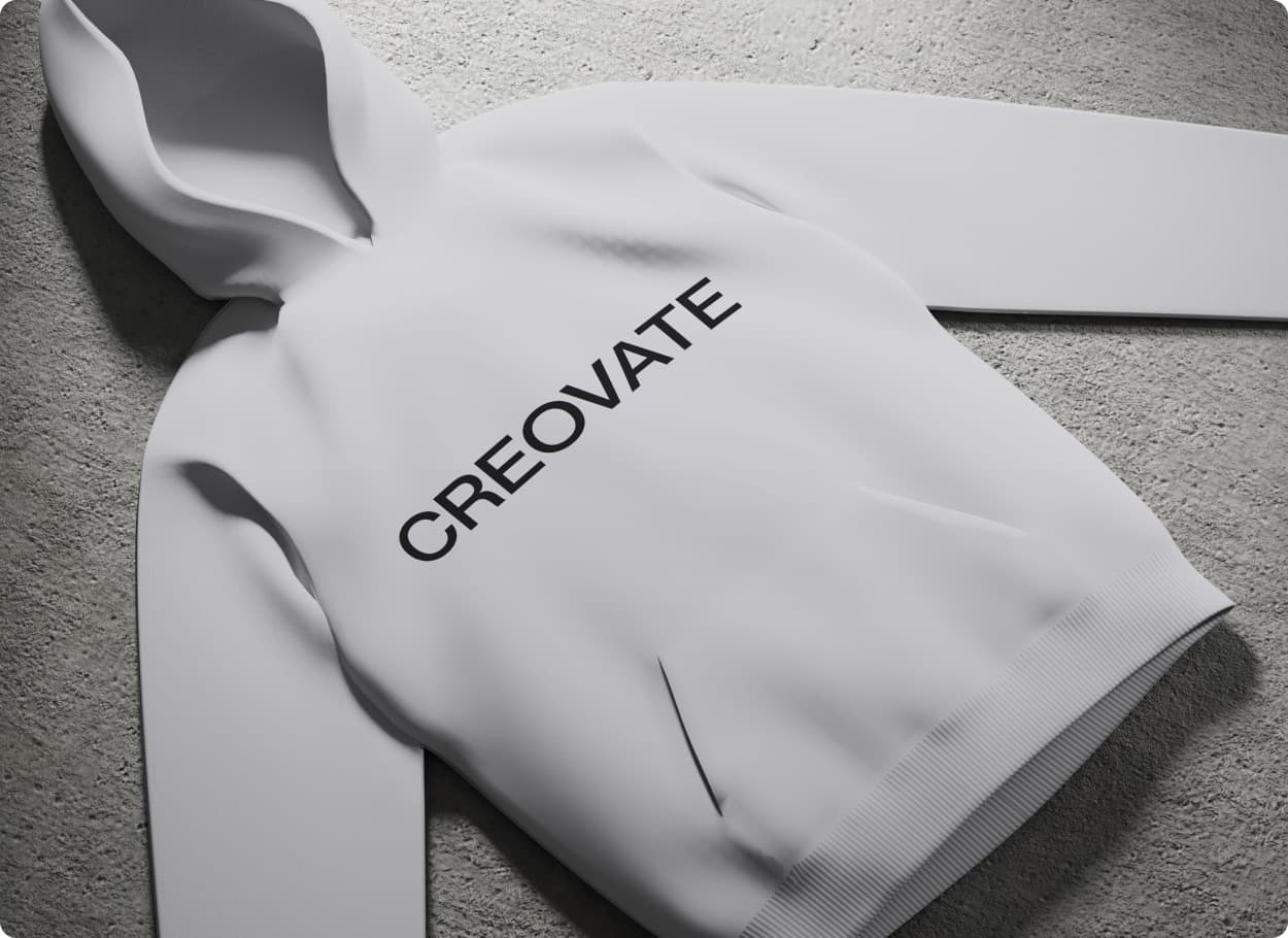 The Creovate wordmark printed on a white hooded sweatshirt