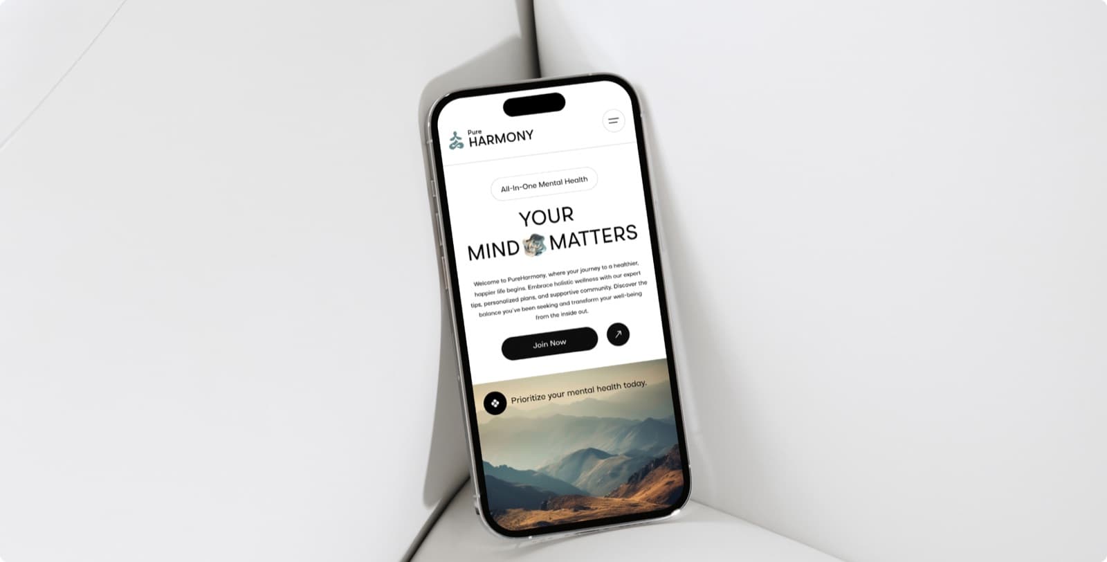 The Pure Harmony website on a phone, with the label All-In-One Mental Health, the headline Your Mind Matters and a Join Now button