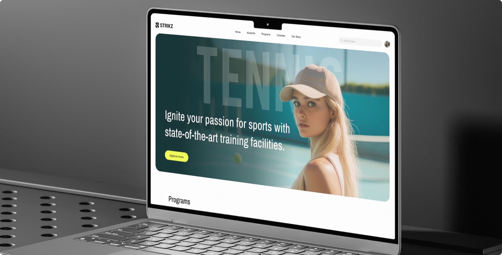 The Strikz homepage on a laptop, with the menu, a tennis player on court and an Explore more button